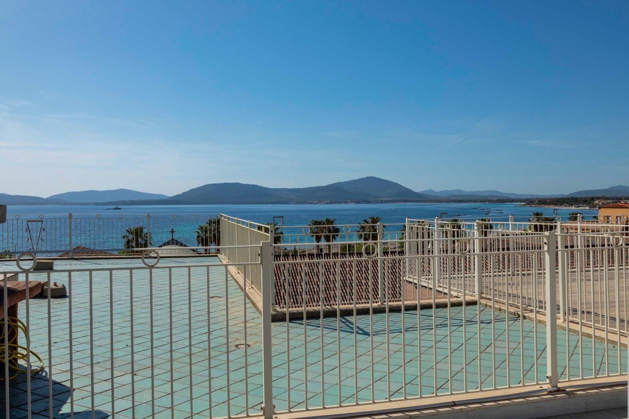 Lovealghero Stanze In Attico Vista Mare Bagian luar foto